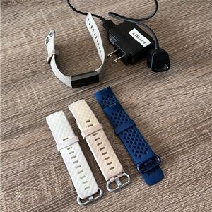 Fitbit Charge 2 with White, Beige, and Blue Bands